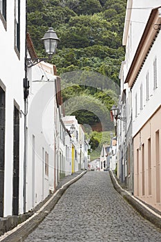 Traditional azores street with paved floor in Pico island. Portu