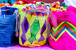 Traditional bags hand knitted by women of the Wayuu community in Colombia called mochilas photo