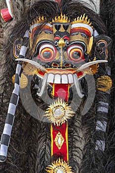 Traditional Balinese Barong mask on street ceremony in island Bali, Indonesia. Closeup