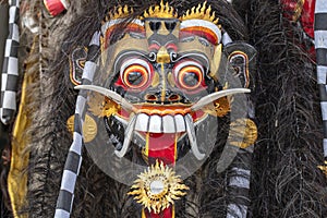 Traditional Balinese Barong mask on street ceremony in island Bali, Indonesia. Closeup