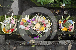 Traditional balinese offerings in a basket in Ubud, Bali, Indonesia