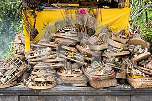 Traditional balinese offerings to Gods burned Indonesia Bali temple