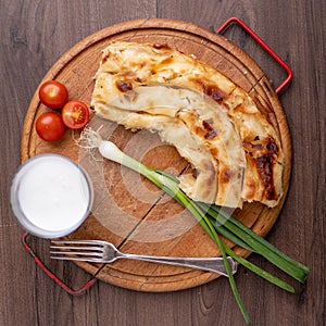 Traditional balkan meal - Burek or Borek pie with cheese photo