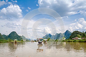 Traditional bamboo raft on Yulong River, Yangshuo, Guangxi, China.