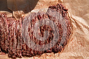 Traditional barbecue steak sliced close-up beef Bavette ready to eat photo