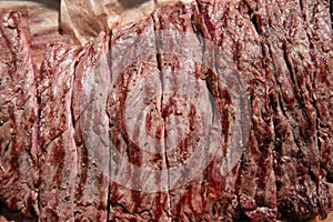 Traditional barbecue steak sliced close-up beef Bavette ready to eat photo