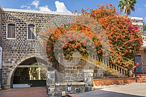 Traditional basalt building with arche photo