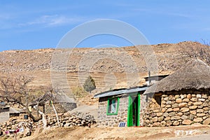 Traditional Basotho Hut with Green Door