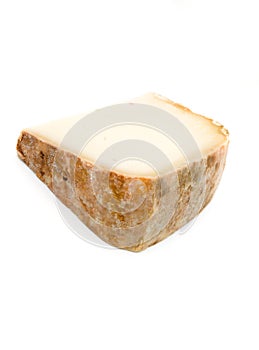 Traditional Basque sheep`s milk cheese on white background