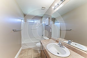 Traditional bathroom interior with antiqued limestone flooring