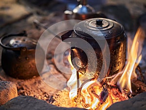 Traditional bedouin tea on fire in the Wadi Rum desert, Jordan