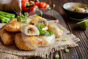 Traditional beef Empanadas with Aji Picante sauce photo