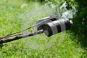 Traditional beekeeping. Smoke device for aggressive bees