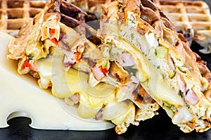 Traditional belgian waffles with cheese and vegetables