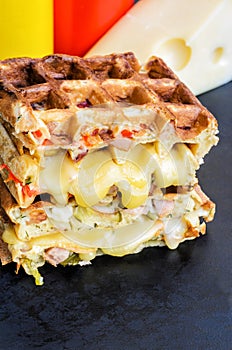 Traditional belgian waffles with cheese and vegetables. Copy space