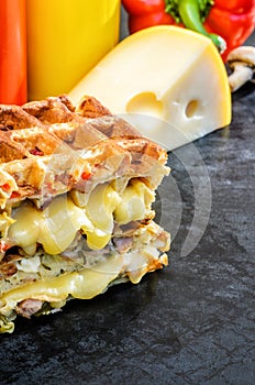 Traditional belgian waffles with cheese and vegetables. Copy space