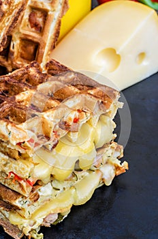 Traditional belgian waffles with cheese and vegetables. Copy space