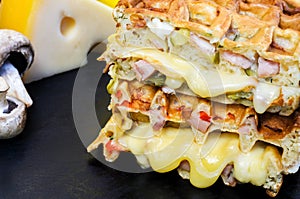 Traditional belgian waffles with cheese and vegetables. Copy space