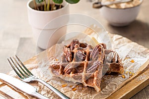 Traditional Belgian waffles with syrup and butter