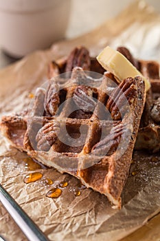 Traditional Belgian waffles with syrup and butter