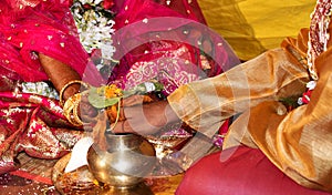 Traditional Bengali wedding in india west bengal, Bride Hand on groom hand