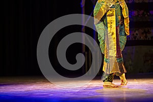 Traditional bharatanatyam dance.Bare feet of indian female dancer on the stage