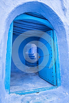 Traditional moroccan door  in Chefchaouen blue city in Morocco