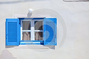 Traditional blue greek style windows in Emporio