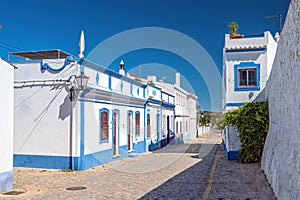 Traditional Fishermen`s Cottages, Cacela Velha, Eastern Algarve, Portugal. photo