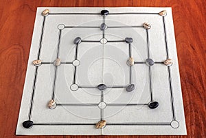 Traditional board for playing Nine Men's Morris game