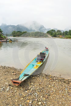 Traditional boat in Nam Song river at Vang Vieng, Laos