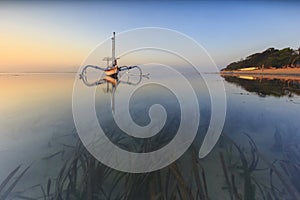 Traditional boat reflections in the morning