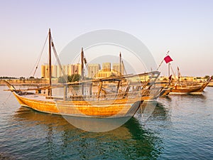 Traditional boats called Dhows are anchored in the port