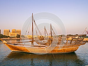 Traditional boats called Dhows are anchored in the port