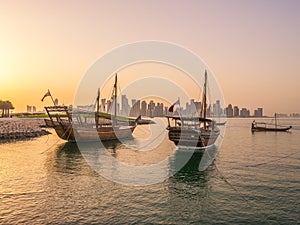 Traditional boats called Dhows are anchored in the port