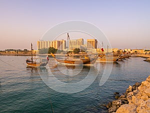 Traditional boats called Dhows are anchored in the port