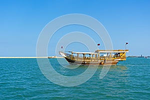 Traditional boats called Dhows are anchored in the port in Doha, Qatar.