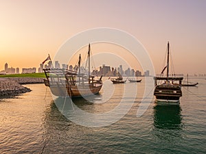 Traditional boats called Dhows are anchored in the port