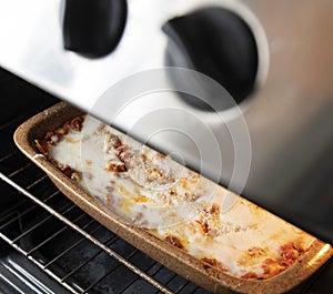 Traditional Bolognese lasagna in cooking