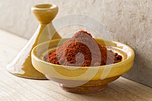 Traditional bowl with Moroccan dried ground paprika