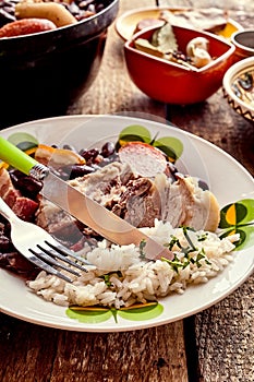 Traditional Brazilian Feijoada with meat and beans