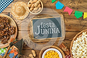 Traditional Brazilian food for summer Brazilian harvest festival. Festa Junina greeting card. Flat lay, top view