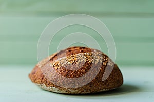 traditional bread loaf on lime wooden board