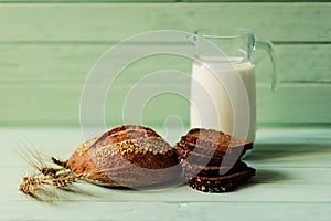 traditional bread loaf on lime wooden board