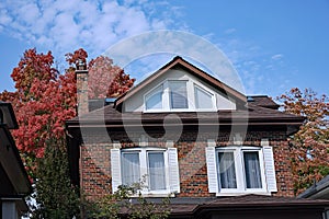 Traditional brick house with dormer window