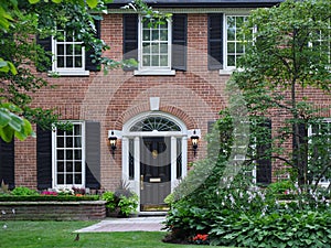 Traditional brick two story house