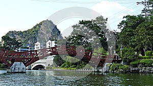 Traditional bridge on Mulong Lake, Guilin, China