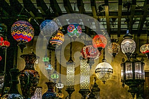 Traditional bright decorative hanging Turkish lamps and colourful lights with vivid colours  in the Istanbul Bazaar, Turkey