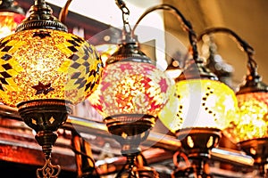 Traditional bright decorative hanging Turkish lamps and colourful lights with vivid colours  in the Istanbul Bazaar, Turkey