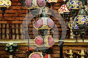 Traditional bright decorative hanging Turkish lamps and colourful lights with vivid colours  in the Istanbul Bazaar, Turkey